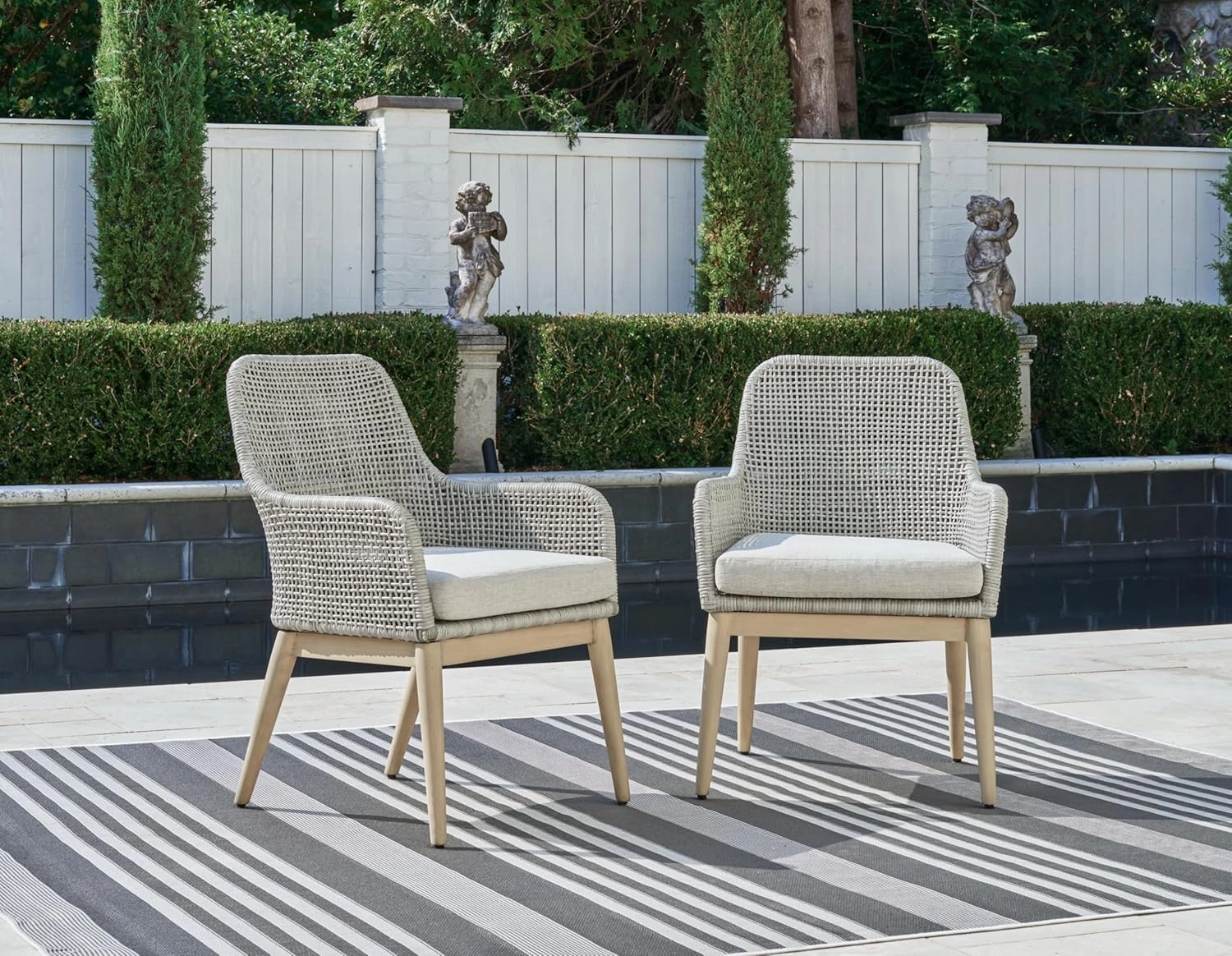 Signature Design by Ashley Seton Creek Cottage Weather Resistant Outdoor Dining Arm Chair with Cushion, Set of 2, Light Brown & Light Gray